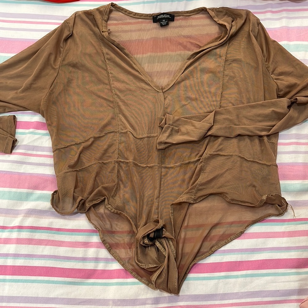 Im selling a see thru body suit very fishnet type of texture size 3XL